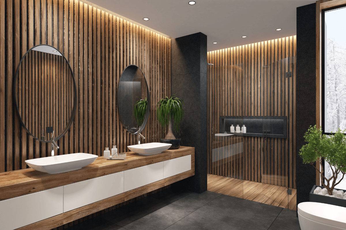 a bathroom with wood walls and a shower