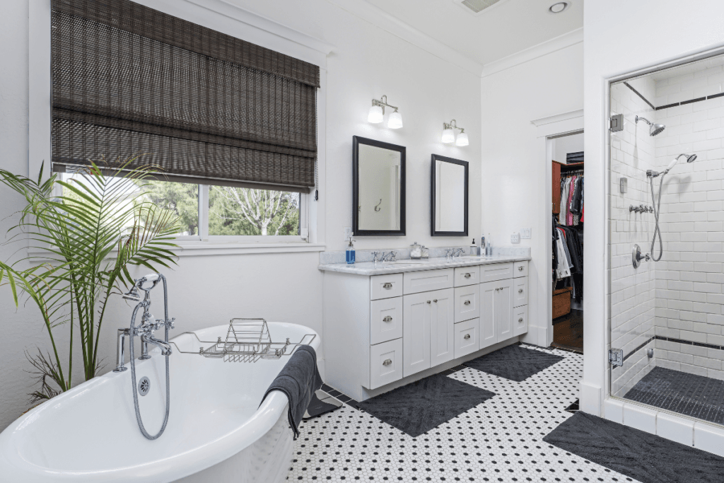a bathroom with a tub and sink