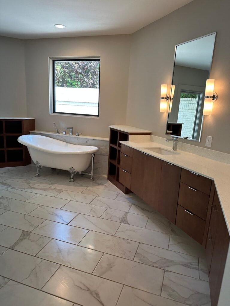 Bathroom with freestanding tub and long vanity after a Gritz cleaning