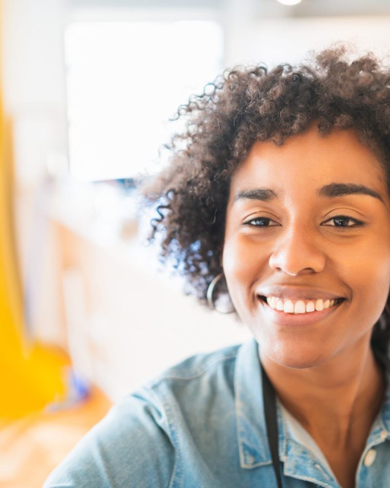 a woman smiling at camera